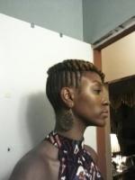 Chic Up-Do Chic updo for black hair at Sabines Hallway Natural Hair Salon & Spa in Brooklyn, NY.